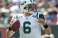 EAST RUTHERFORD, NJ - SEPTEMBER 20:  Mark Sanchez #6 of the New York Jets drops back to pass against the New England Patriots at Giants Stadium on September 20, 2009 in East Rutherford, New Jersey.  (Photo by Nick Laham/Getty Images)