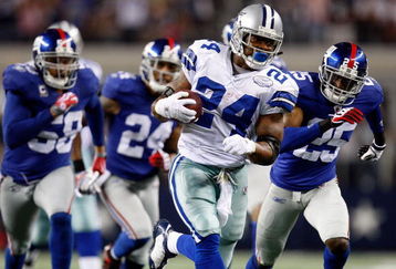 ARLINGTON, TX - SEPTEMBER 20:  Running back Marion Barber #24 of the Dallas Cowboys runs the ball past Bruce Johnson #25 of the New York Giants at Cowboys Stadium on September 20, 2009 in Arlington, Texas.  (Photo by Ronald Martinez/Getty Images)