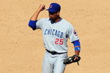 LOS ANGELES, CA - AUGUST 23:  Derrek Lee #25 of the Chicago Cubs Celebrates a play while playing the Los Angeles Dodgers on August 23, 2009 at Dodger Stadium in Los Angeles, California.  (Photo by Jacob de Golish/Getty Images)