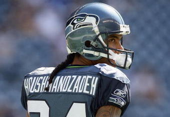 SEATTLE , WA - SEPTEMBER 13:  T.J. Houshmandzadeh #84 of the Seattle Seahawks looks on the field before the game against the St. Louis Rams at Qwest Field on September 13, 2009 in Seattle, Washington. (Photo by Otto Greule Jr/Getty Images)