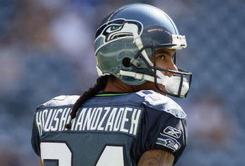 SEATTLE , WA - SEPTEMBER 13:  T.J. Houshmandzadeh #84 of the Seattle Seahawks looks on the field before the game against the St. Louis Rams at Qwest Field on September 13, 2009 in Seattle, Washington. (Photo by Otto Greule Jr/Getty Images)