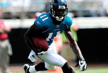 JACKSONVILLE, FL - SEPTEMBER 20:  Mike Sims-Walker #11 of the Jacksonville Jaguars runs for yardage during the game against the Arizona Cardinals at Jacksonville Municipal Stadium on September 20, 2009 in Jacksonville, Florida.  (Photo by Sam Greenwood/Getty Images)