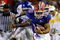 GAINESVILLE, FL - SEPTEMBER 23:  Quarterback Tim Tebow #15 of the Florida Gators breaks a tackle against the Kentucky Wildcats on September 23, 2006 at Ben Hill Griffin Stadium at Florida Field  in Gainesville, Florida. The Gators defeated the Wildcats 26 to 7.  (Photo by Marc Serota/Getty Images)