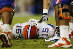 LEXINGTON, KY - SEPTEMBER 26: Quarterback Tim Tebow #15 of the Florida Gators lays on the ground after being sacked by Taylor Wyndham #94 of the Kentucky Wildcats during the third quarter of the game at Commonwealth Stadium on September 26, 2009 in Lexington, Kentucky. (Photo by Andy Lyons/Getty Images)