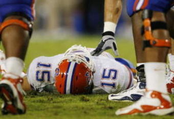 LEXINGTON, KY - SEPTEMBER 26: Quarterback Tim Tebow #15 of the Florida Gators lays on the ground after being sacked by Taylor Wyndham #94 of the Kentucky Wildcats during the third quarter of the game at Commonwealth Stadium on September 26, 2009 in Lexington, Kentucky. (Photo by Andy Lyons/Getty Images)