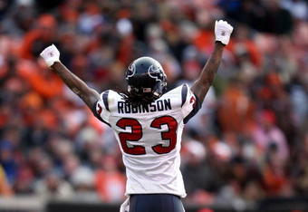 CLEVELAND - NOVEMBER 23:  Dunta Robinson #23 of the Houston Texans celebrates a missed field goal by the Cleveland Browns during the NFL game at Cleveland Browns Stadium on November 23, 2008 in Cleveland, Ohio.  (Photo by Andy Lyons/Getty Images)