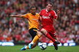 LIVERPOOL, ENGLAND - SEPTEMBER 26:  Jamie Carragher of Liverpool battles for the ball with Geovanni of Hull City during the Barclays Premier League match between Liverpool and Hull City at Anfield on September 26, 2009 in Liverpool, England. (Photo by Clive Brunskill/Getty Images)