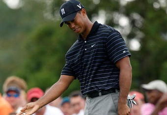 ATLANTA, GEORGIA - SEPTEMBER 26:  Tiger Woods reacts after missing a birdie putt on the 14th green during the third round of THE TOUR Championship presented by Coca-Cola, the final event of the PGA TOUR Playoffs for the FedExCup, at East Lake Golf Club on September 26, 2009 in Atlanta, Georgia.  (Photo by Kevin C. Cox/Getty Images)