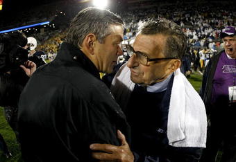 STATE COLLEGE, PA - SEPTEMBER 26:  Head coach Kirk Ferentz of the Iowa Hawkeyes shakes hands with head coach Joe Paterno of the Penn State Nittnay Lions after defeating them 21-10 on September 26, 2009 at Beaver Stadium in State College, Pennsylvania.  (Photo by Gregory Shamus/Getty Images)