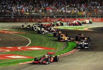 SINGAPORE - SEPTEMBER 27:  Lewis Hamilton of Great Britain and McLaren Mercedes leads the field at the start of the Singapore Formula One Grand Prix at the Marina Bay Street Circuit on September 27, 2009 in Singapore.  (Photo by Clive Mason/Getty Images)