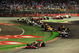 SINGAPORE - SEPTEMBER 27: Lewis Hamilton of Great Britain and McLaren Mercedes leads the field at the start of the Singapore Formula One Grand Prix at the Marina Bay Street Circuit on September 27, 2009 in Singapore. (Photo by Clive Mason/Getty Images)