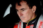 DOVER, DE - SEPTEMBER 26:  Mike Bliss, driver of the 09 Miccosukee Indian Gaming & Resort Dodge waits in the garage during practice for the NASCAR Sprint Cup Series AAA 400 at Dover International Speedway on September 26, 2009 in Dover, Delaware.  (Photo by Jeff Zelevansky/Getty Images for NASCAR)