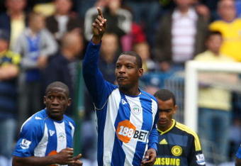 WIGAN, ENGLAND - SEPTEMBER 26:  Titus Bramble of Wigan Athletic celebrates scoring during the Barclays Premier League match between Wigan Athletic and Chelsea at DW Stadium on September 26, 2009 in Wigan, England.  (Photo by Phil Cole/Getty Images)