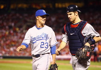 ST. LOUIS, MO - JULY 14:  American League All-Stars Zack Greinke of the Kansas City Royals and Joe Mauer of the Minnesota Twins walk off the field during the 2009 MLB All-Star Game at Busch Stadium on July 14, 2009 in St Louis, Missouri. (Photo by Jamie Squire/Getty Images)