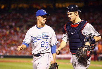 ST. LOUIS, MO - JULY 14:  American League All-Stars Zack Greinke of the Kansas City Royals and Joe Mauer of the Minnesota Twins walk off the field during the 2009 MLB All-Star Game at Busch Stadium on July 14, 2009 in St Louis, Missouri. (Photo by Jamie Squire/Getty Images)