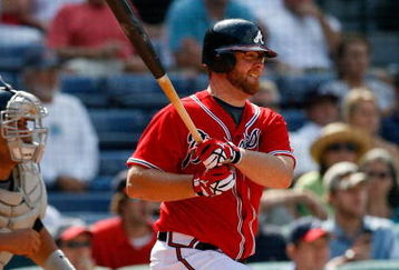 ATLANTA - AUGUST 23:  Brian McCann #16 of the Atlanta Braves hits a two-run single in the bottom of the eighth inning against the Florida Marlins on August 23, 2009 at Turner Field in Atlanta, Georgia.  (Photo by Kevin C. Cox/Getty Images)