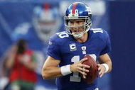 EAST RUTHERFORD, NJ - SEPTEMBER 13:  Eli Manning #10 of the New York Giants looks to pass against the Washington Redskins on September 13, 2009 at Giants Stadium in East Rutherford, New Jersey.  (Photo by Jim McIsaac/Getty Images)