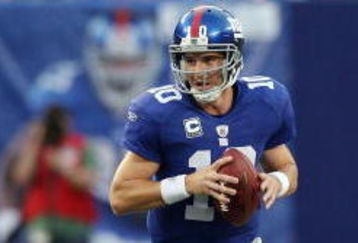 EAST RUTHERFORD, NJ - SEPTEMBER 13:  Eli Manning #10 of the New York Giants looks to pass against the Washington Redskins on September 13, 2009 at Giants Stadium in East Rutherford, New Jersey.  (Photo by Jim McIsaac/Getty Images)