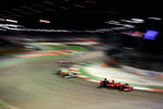 SINGAPORE - SEPTEMBER 27:  Giancarlo Fisichella of Italy and Ferrari drives during the Singapore Formula One Grand Prix at the Marina Bay Street Circuit on September 27, 2009 in Singapore.  (Photo by Clive Mason/Getty Images)