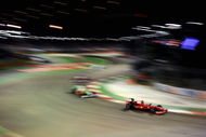 SINGAPORE - SEPTEMBER 27:  Giancarlo Fisichella of Italy and Ferrari drives during the Singapore Formula One Grand Prix at the Marina Bay Street Circuit on September 27, 2009 in Singapore.  (Photo by Clive Mason/Getty Images)