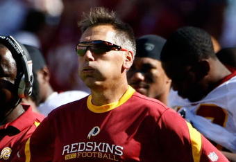 LANDOVER, MD - SEPTEMBER 20:  Head coach Jim Zorn of the Washington Redskins exhales as his team runs out the clock against the St. Louis Rams during their game on September 20, 2009 at FedEx Field in Landover, Maryland.  The Redskins defeated the Rams by a score of 9-7.  (Photo by Win McNamee/Getty Images)