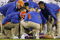 LEXINGTON, KY - SEPTEMBER 26: Quarterback Tim Tebow #15 of the Florida Gators is tended to by head coach Urban Meyer (R) and staff after Tebow was sacked by Taylor Wyndham #94 of the Kentucky Wildcats during the third quarter of the game at Commonwealth Stadium on September 26, 2009 in Lexington, Kentucky. (Photo by Andy Lyons/Getty Images)