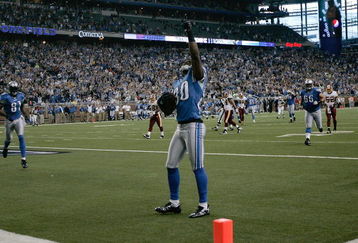 DETROIT, MI - SEPTEMBER 27: Wide receiver Bryant Johnson #80 of the Detroit Lions celebrates after scoring a touchdown in the first quarter against the Washington Redskins at Ford Field on September 27, 2009 in Detroit, Michigan. (Photo by Scott Boehm/Getty Images)
