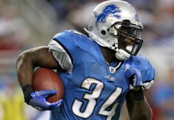DETROIT - SEPTEMBER 20:  Running back Kevin Smith #34 of the Detroit Lions carries the bll against the Minnesota Vikings at Ford Field on September 20, 2009 in Detroit, Michigan. The Vikings won 27-13.  (Photo by Stephen Dunn/Getty Images)