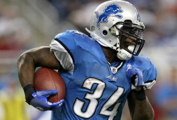 DETROIT - SEPTEMBER 20:  Running back Kevin Smith #34 of the Detroit Lions carries the bll against the Minnesota Vikings at Ford Field on September 20, 2009 in Detroit, Michigan. The Vikings won 27-13.  (Photo by Stephen Dunn/Getty Images)
