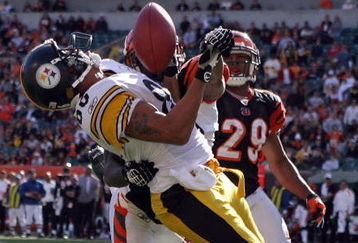CINCINNATI - OCTOBER 19:  Hines Ward #86 of the Pittsburgh Steelers attempts to catch a pass during the NFL game against the Cincinnati Bengals at Paul Brown Stadium on October 19, 2008 in Cincinnati, Ohio. The pass was incomplete but Johnathan Joseph #22 of the Bengals was penalized for pass interfernce on the play.  The Steelers won 38-10.  (Photo by Andy Lyons/Getty Images)