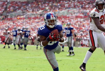 TAMPA, FL - SEPTEMBER 27:  Receiver Sinorice Moss #83 of the New York Giants catches a touchdown over defender Aqib Talib #25 of the Tampa Bay Buccaneers during the game at Raymond James Stadium on September 27, 2009 in Tampa, Florida.  (Photo by J. Meric/Getty Images)