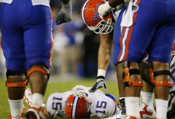 LEXINGTON, KY - SEPTEMBER 26: Quarterback Tim Tebow #15 of the Florida Gators lays on the ground after being sacked by Taylor Wyndham #94 of the Kentucky Wildcats during the third quarter of the game at Commonwealth Stadium on September 26, 2009 in Lexington, Kentucky. (Photo by Andy Lyons/Getty Images)