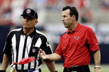 HOUSTON - SEPTEMBER 27:  Head coach Gary Kubiak of the Houston Texans throws his red flag as he challenges a late fumble call at Reliant Stadium on September 27, 2009 in Houston, Texas.  (Photo by Bob Levey/Getty Images)