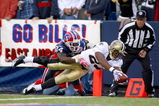 ORCHARD PARK, NY - SEPTEMBER 27: Pierre Thomas #23  of the New Orleans Saints dives for the pylon to score a touchdown as Terrence McGee #24 defends for the Buffalo Bills at Ralph Wilson Stadium on September 27, 2009 in Orchard Park, New York.  (Photo by Rick Stewart/Getty Images)