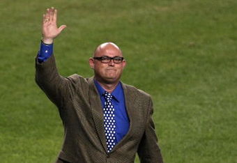NEW YORK - SEPTEMBER 21:  Ronan Tynan waves to the crowd after peforming God Bless America during the seventh inning stretch at the last regular season game at Yankee Stadium on September 21, 2008 in the Bronx borough of New York City. The Yankees are playing their final season in the 85 year old ball park and plan on moving into the new Yankee Stadium across the street to start the 09 season.  (Photo by Nick Laham/Getty Images)