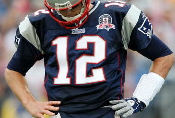 FOXBORO, MA - SEPTEMBER 27:  Quarterback Tom Brady #12 of the New England Patriots reacts to a play in the third quarter of the game against the Atlanta Falcons at Gillette Stadium on September 27, 2009 in Foxboro, Massachusetts.  (Photo by Elsa/Getty Images)