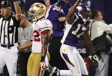 MINNEAPOLIS - SEPTEMBER 27: Greg Lewis #17 of the Minnesota Vikings holds the ball after catching a touchdown pass with two seconds on the clock to defeat Nate Clements #22 and the San Francisco 49ers at the Hubert H. Humphrey Metrodome on September 27, 2009 in Minneapolis, Minnesota. The Vikings defeated the 49ers 27-24. (Photo by Jonathan Daniel/Getty Images)