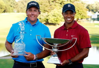 ATLANTA - SEPTEMBER 27:  Phil Mickelson (L), winner of THE TOUR Championship presented by Coca-Cola poses alongside Tiger Woods, winner of the 2009 FedExCup at East Lake Golf Club on September 27, 2009 in Atlanta, Georgia.  (Photo by Scott Halleran/Getty Images)