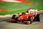 SINGAPORE - SEPTEMBER 27:  Kimi Raikkonen of Finland and Ferrari drives during the Singapore Formula One Grand Prix at the Marina Bay Street Circuit on September 27, 2009 in Singapore.  (Photo by Clive Mason/Getty Images)
