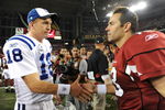GLENDALE, AZ - SEPTEMBER 27:  (L-R) Peyton Manning #18 of the Indianapolis Colts shakes hands with Kurt Warner #13 of the Arizona Cardinals after the Colts defeated the Cardinals 31-10 during the game at University of Phoenix Stadium on September 27, 2009 in Glendale, Arizona. (Photo by Harry How/Getty Images)