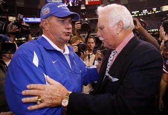NEW ORLEANS - DECEMBER 21:  Head coach Howard Schnellenberger (R) of the Florida Atlantic University Owls is congratulated by Head coach Tommy West of the Memphis University Tigers in the New Orleans Bowl on December 21, 2007 at the Louisiana Superdome in New Orleans, Louisiana.  (Photo by Chris Graythen/Getty Images)