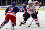 NEW YORK - SEPTEMBER 24:  Alex Ovechkin #8 of the Washington Capitals skates against Dan Girardi #5 of the New York Rangers during their preseason game on  September 24, 2009 at Madison Square Garden in New York City.  (Photo by Jim McIsaac/Getty Images)