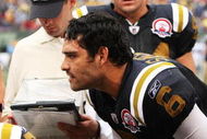 EAST RUTHERFORD, NJ - SEPTEMBER 27: Mark Sanchez #6 of The New York Jets talks to his offense during the game against The Tennessee Titans during their game on September 27, 2009 at Giants Stadium in East Rutherford, New Jersey. (Photo by Al Bello/Getty Images)