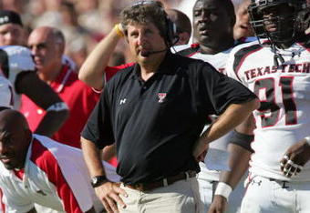 COLLEGE STATION, TX -SEPTEMBER 30:  Head coach Mike Leach of the Texas Tech Red Raiders watches the action from the sidelines during the game against the Texas A&M Aggies at Kyle Field on September 30, 2006 in College Station, Texas. (Photo by Ronald Martinez/Getty Images)