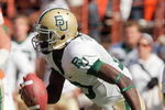 AUSTIN, TX - NOVEMBER 8:  Quarterback Robert Griffin #10 of the Baylor Bears runs the ball during the game against the Texas Longhorns on November 8, 2008 at Darrell K Royal-Texas Memorial Stadium in Austin, Texas.  Texas won 45-21. (Photo by Brian Bahr/Getty Images)