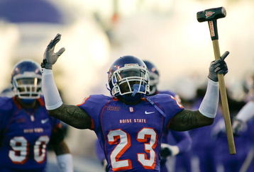BOISE, ID - NOVEMBER 28:  Jeron Johnson #23 of the Boise State Broncos leads his team onto the field before their game against the Fresno State Bulldogs on November 28, 2008 at Bronco Stadium in Boise, Idaho.  (Photo by Otto Kitsinger III/Getty Images)
