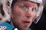 GLENDALE, AZ - SEPTEMBER 26:  Dany Heatley #15 of the San Jose Sharks watches from the bench during the preseason NHL game against the Phoenix Coyotes at Jobing.com Arena on September 26, 2009 in Glendale, Arizona.  The Coyotes defeated the Sharks 2-0.  (Photo by Christian Petersen/Getty Images)