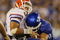 LEXINGTON, KY - SEPTEMBER 26: Quarterback Tim Tebow #15 of the Florida Gators is sacked by Taylor Wyndham #94 of the Kentucky Wildcats during the third quarter of the game at Commonwealth Stadium on September 26, 2009 in Lexington, Kentucky. (Photo by Andy Lyons/Getty Images)