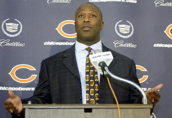 LIBERTYVILLE, IL - JANUARY 15:  Lovie Smith, former defensive coordinator for the St. Louis Rams, gestures as he announces his four year contract as head coach of the Chicago Bears at a media conference on January 15, 2004 in Libertyville, Illinois.  (Photo by Aynsley Floyd/Getty Images)
