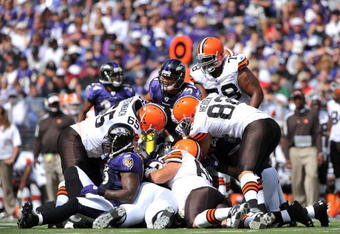 BALTIMORE - SEPTEMBER 27:  Brendon Ayanbadejo #51 of the Baltimore Ravens helps make a tackle against the Cleveland Browns at M&T Bank Stadium on September 27, 2009 in Baltimore, Maryland. The Ravens defeated the Browns 34-3. (Photo by Larry French/Getty Images)